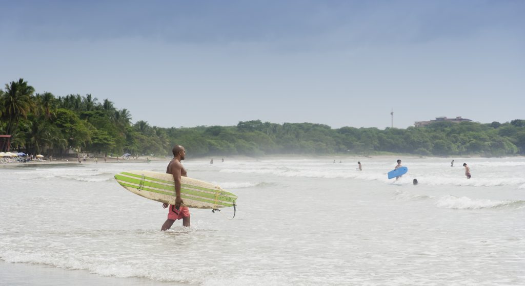 People on Tamarindo Beach in Costa Rica