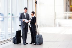 business traveler at airport with insurance